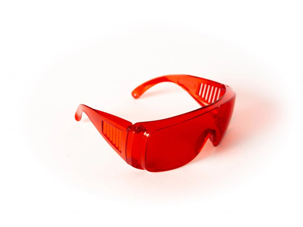 Red glasses against blue and green light