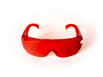 Red glasses against blue and green light