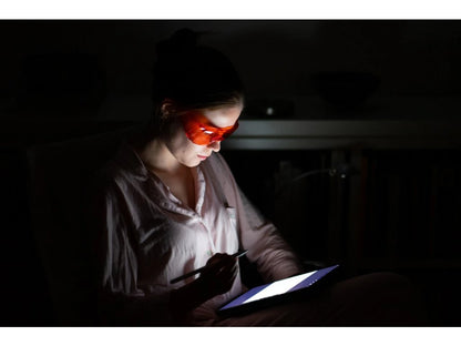 Red glasses against blue and green light